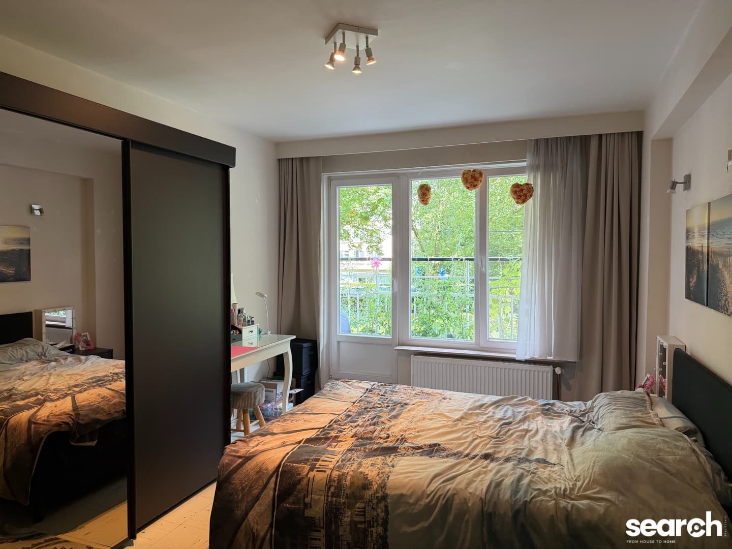 Ruim appartement met 2 slaapkamers en terras! 9